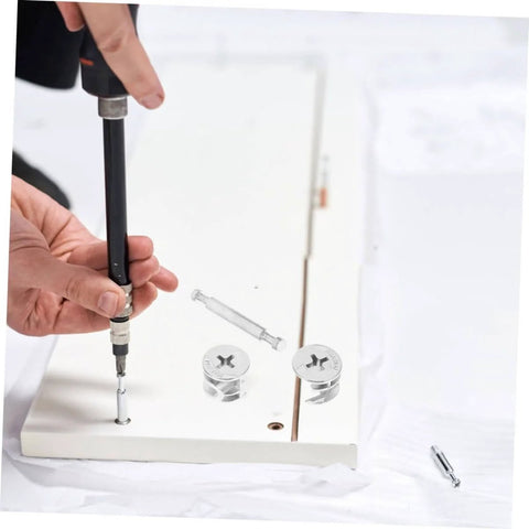 Person assembling furniture with 20 Sets Cam Fittings Kit For Furniture Connectors With Dowels And Fasteners For Cabinet Assembly