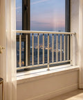 No Drills No Drama Drill Free Balcony Guardrail Boasting Built Like A Tank Alloy Frame in bright apartment setting.