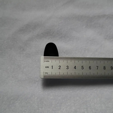 Iron alloy fuchi cap shown with ruler, part of Fuchi Kashira Iron Alloy Set For Samurai Tsuka Handle Ferrule Caps 01 To 07