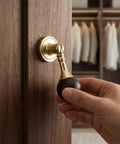 Gold Pendant Knobs Set 12 Pack for Cabinets and Furniture, Heavy Duty Zinc Alloy With Wood Ball being installed on wooden door.