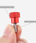 Close-up of Six Pack M4 10mm Stainless Steel Knurled Thumb Screws With Red Aluminum Heads, showcasing detailed grip and threading.