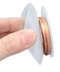 Hand holding desoldering wick solder removal braid copper alloy no clean high efficiency pro grade for electronics repair PCB work