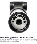 Close-up of Suspension Seatpost 27.2mm With Dust Sleeve for Road, Mountain and E-Bikes, adjustable shock absorption control.