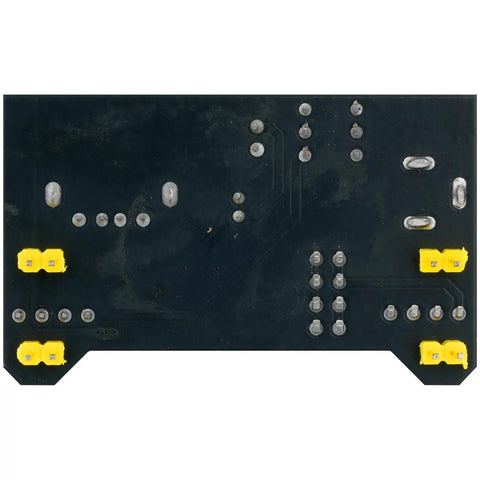 Hella Reliable Dual Voltage Power Supply Module Adapts To 400 And 830 Point Solderless Breadboards with yellow connectors and circuit traces.