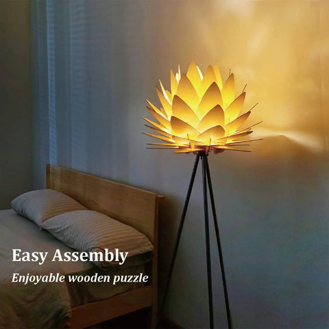 Boho Lotus Flower Floor Lamp With Tripod Stand beside bed, cozy glow and chill vibe, soft glare free light for bedroom and living room.