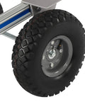 Close-up of a smooth 10 inch pneumatic tire on the Rugged Aluminum Folding Hand Truck And Rolling Dolly Cart With 500 Pound Capacity.