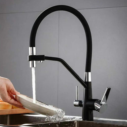 GAZOGJ 3-Way Kitchen Faucet with 360°Rotatable Shower Head, stylish black finish, dual lever tap in use over a sink.