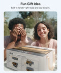 Two people with a foldable Class 1 laser engraver gift box, showing packaging with easy app control for engraving jewelry and gifts.