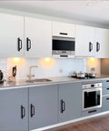 Kitchen with gray and white cabinets featuring 12 Pack Matte Black Cabinet Pull Handles With Base Plate Aluminum Alloy, 5 Inch Hole Center