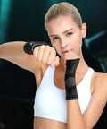 Woman wearing Wrist Compression Sleeves Pair For Carpal Tunnel Pain Relief And Support For Women And Men Breathable Sweat Absorbing