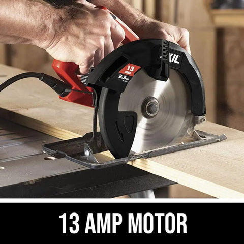 Close-up of Heavy Hitter 13 Amp 7 1/4 Inch Corded Circular Saw in bright red cutting through wood.