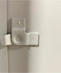 Close-up view of the stainless steel cam latch on the Heavy Duty Flush Mount Access Panel Door with concealed hinge.