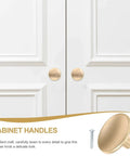 Gold Zinc Alloy Cabinet Pull Handle, Single Hole Door Pull For Wardrobe And Drawer, Heavy Duty Metal Furniture Knob Replacement shown on white doors