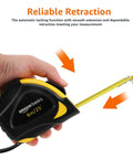 Self Locking Tape Measure 25 Ft Two Pack With Dual Inch And Metric Scales MID Accuracy held in hand