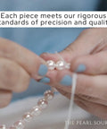 Close-up of a person stringing pearls for Must Have 14K Gold Akoya Pearl Necklace Bracelet Earrings Set With 18 Inch Princess Length For Women 7.5 To 8mm Round White Cultured Pearls High Luster Classic Elegant Jewelry Trio.