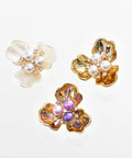 Shell Pearl Flower Cufflinks And Shirt Sleeve Button Covers, Boss Level Shine In Elegant Alloy Electroplated Finish, Gardenia Inspired Purple Pearl Gold Look, Luxury Dress Shirt Jewelry For A Sharp Modern Style. Three cufflinks with pearl-centered flower designs in white, gold, and purple.