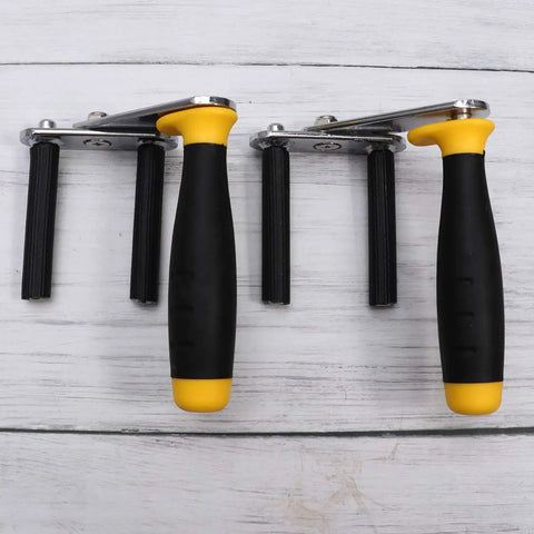 One Pair Hella Strong Grip Gypsum Board Lifter Portable Ceramic Tile Suction Cup And Glass Moving Tool With Rubber Alloy Handles on a wood surface.
