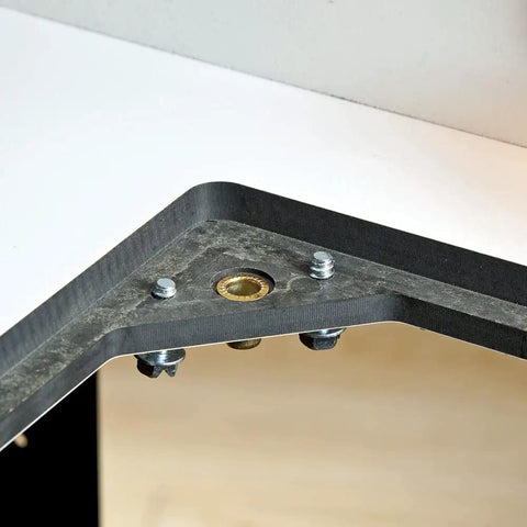 Close-up of Heavy Duty Solid Phenolic Router Table Top with Tight Ten Point Plate Leveling Rig and metal screws.