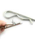 Hand holding 2 Pack Stainless Steel R Clips Hairpin Cotter Pins For Quick Securement M5x100 Zinc Coated For Outdoor And Indoor Use