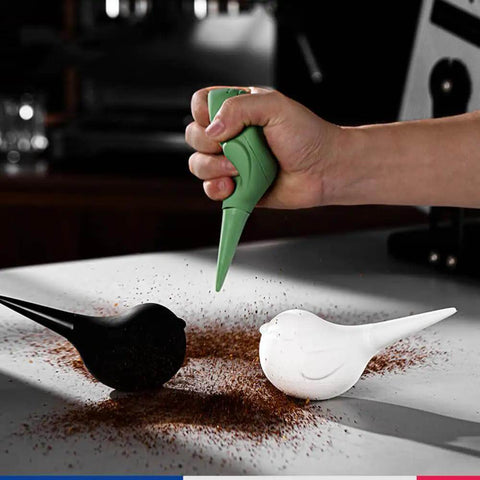 Hand using Dope Bird Inspired Coffee Air Blower Air Duster For Espresso Machines And Delicate Electronics Removable Pump Cleaning Tool In White