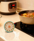 Dual Mode 60 Minute Mechanical Kitchen Timer with Magnetic Back and Built In Stand for Cooking and Baking in kitchen setting