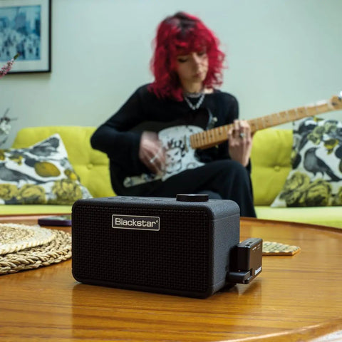 Beam Mini Portable Guitar Amp With NAM Compatibility, 17 Models, 35 Plus Effects, USB C And Bluetooth on table