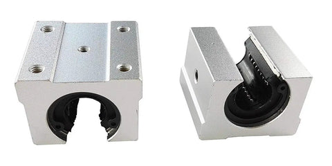 Close-up of two SBR12UU slider blocks from the Heavy Duty Linear Rail Kit With Two 1000mm Rails And Four SBR12UU Slider Blocks End Stops Included