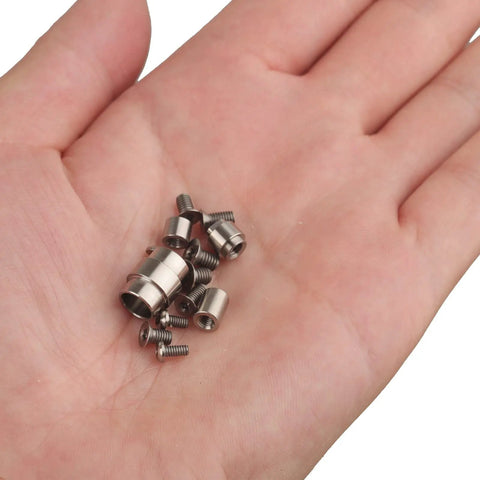 Premium 13 Piece Titanium Hardware Kit For Spyderco C81 Knife with various screws and spacers held in a hand.