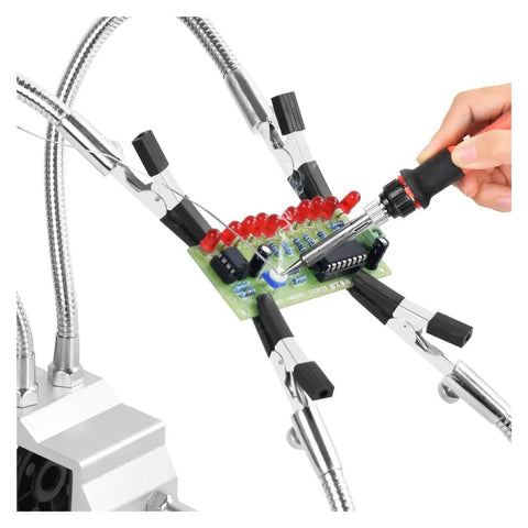 Four Arm Third Hand Soldering Station with Adjustable Gooseneck Arms holding PCB for Soldering Repair