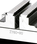 Close-up of Heavy Duty CNC Concentric Turntable Vise jaw with precision engraving for machining workholding.