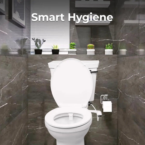 Ultra Slim Left Handed Bidet Attachment For Toilet With Pressure Controls installed on white toilet in modern bathroom