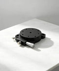 60Mm Manual Precision Rotation Stage Aluminum Platform R Shaft on a marble surface, designed for optical alignment.