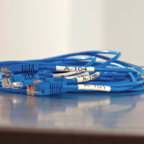 Killer Heat Shrink Tube Cassette For Heavy Label Jobs with labeled blue cables for industrial tagging.