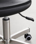 Close-up of the swivel mechanism on the Straight Up Heavy Duty Stainless Steel Swivel Stool With Smooth Rolling Casters.