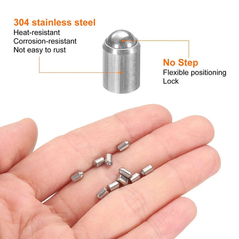 Heavy Duty 30 Pack 3X4MM Ball Point Spring Plungers Built Dead Tough From 304 Stainless Steel For Secure Door Catches and Easy Mechanical Updates. A hand holding multiple steel plungers.