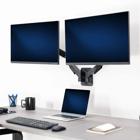 Super Smooth Heavy Duty Double Arm Dual Monitor Wall Mount With Zero Hassle Quick Height Adjustment For Two 17 To 32 Inch Monitors, black finish, two monitors mounted above desk.