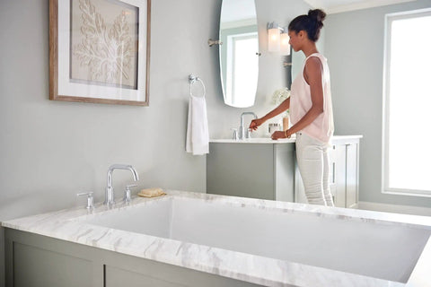 Gibson Chrome Two-Handle Deck Mounted Modern Roman Tub Faucet T961 in a contemporary bathroom setup