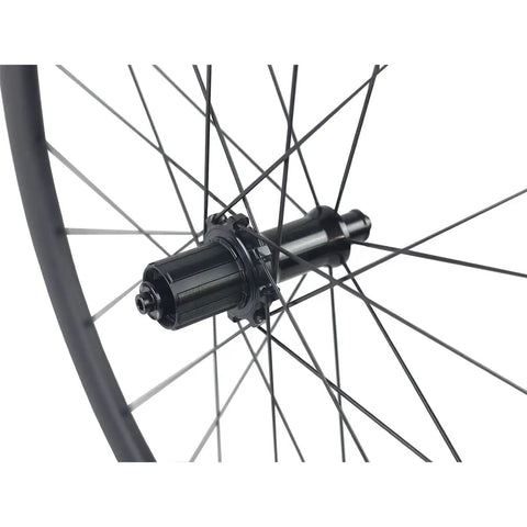 Rear hub and spokes of Dope 700C Carbon Clincher Wheelset With 38mm Aero Rim Tubeless Ready Road Bike Wheels For Rim Brake