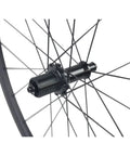 Close-up of Thirty Eight Millimeter Carbon Clincher Road Bike Wheelset Tubeless Ready Rim Brake with Sapim CX Ray Spokes and RT030 Hub