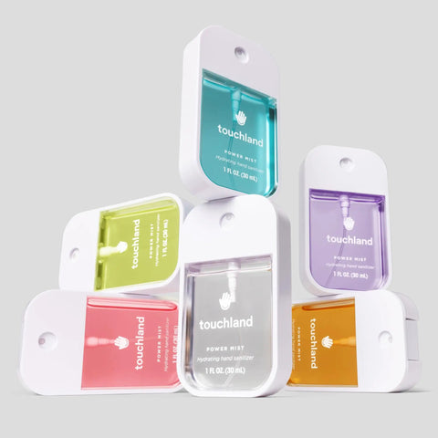 Hydrating Hand Sanitizer Spray Trio Set With Aloe Vera And Essential Oils in stacked 1 fl oz travel mists, colorful packaging