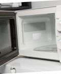 Microwave Mica Sheet Insulation Plates Set 10 Pack inside microwave oven, showcasing heat-resistant cuttable mica plate for replacement.