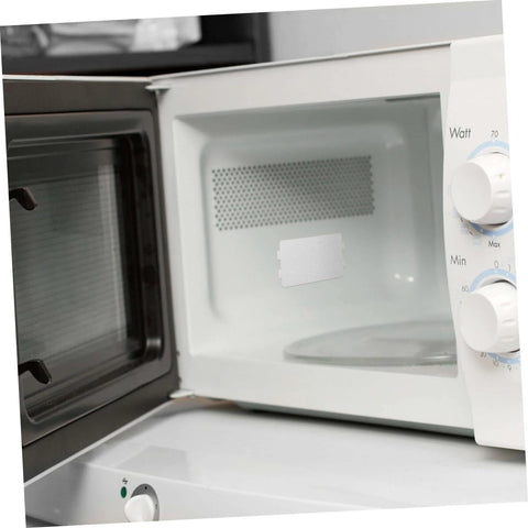 Microwave Mica Sheet Insulation Plates Set 10 Pack inside microwave oven, showcasing heat-resistant cuttable mica plate for replacement.
