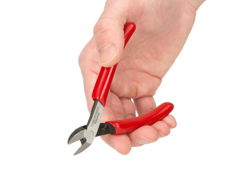 Hand holding Diagonal Cutting Pliers from Compact Five Piece Mini Pliers Set With Needle Nose, Long Nose, Flat Nose, Diagonal Cutting And End Cutting Pliers For Precision Crafting And Electronics Projects, Durable Handy Pro Grade Kit
