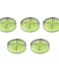 Set of five transparent spirit levels for precision measuring and layout tasks, featuring circular designs and clear markings.