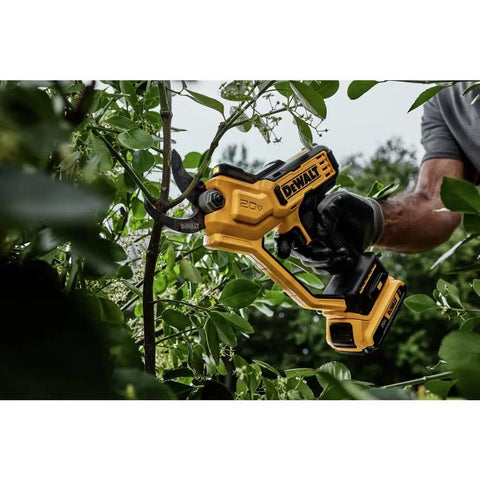 Image of 20V Cordless Pruning Shears Bare Tool With Nonstick Blades, LED Work Light in use cutting a branch in a garden.