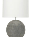 Round Terracotta Table Lamp With Canvas Shade In Distressed Grey Finish, featuring modern boho design and cylindrical canvas shade.