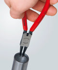 Internal Circlip Pliers Straight For Bore Diameters From 0.75 Inches Up To 2.359 Inches One Piece Forged Tips With Non Slip For Installing Or Removing Snap Rings In Bores Pro Grade shown being used on metal bore