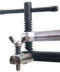 Strong Hand Tools CPL45 pipe fit-up clamp for 2–4 in pipes; silver metal body, black T-handle.