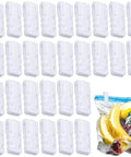 30 Pack Vacuum Storage Bag Sealing Clips Quick Snap Zipper Grips, white plastic clips, arranged beside sealed vacuum storage bag with fruit.