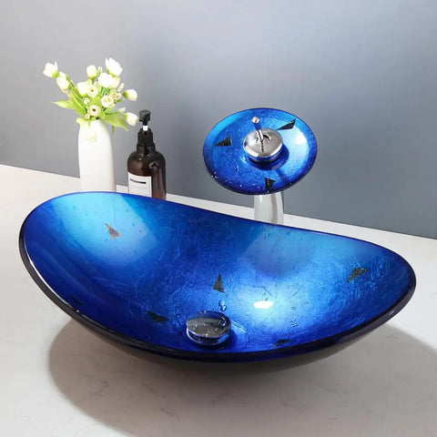 Cool Black Blue Glass Vessel Sink With Waterfall Faucet And Drain Oval Boat Shape Above Counter Modern Tempered Glass Bathroom Sink Artistic Glass Wash Basin For Contemporary Bathrooms showcased on a white counter